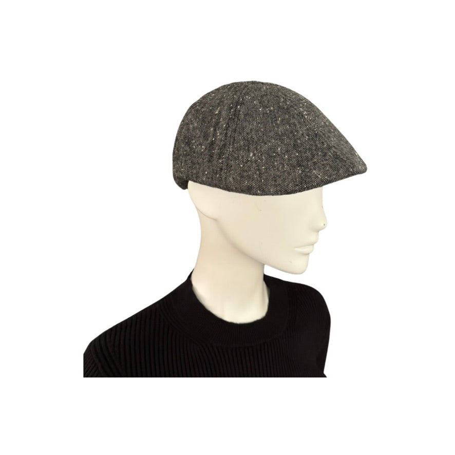 Mannequin head wearing a dark gray knit cap on a white background