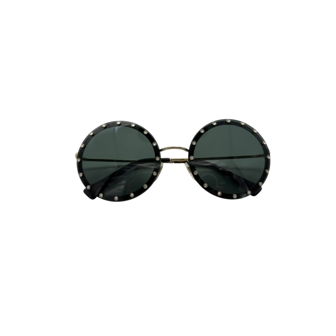 Round sunglasses with black frames and dark lenses on a white background