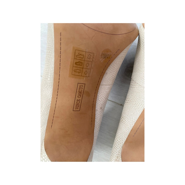 Close-up of a shoe sole with brand logo on a white background