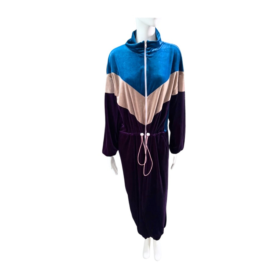 Color-blocked jumpsuit on a mannequin against a white background