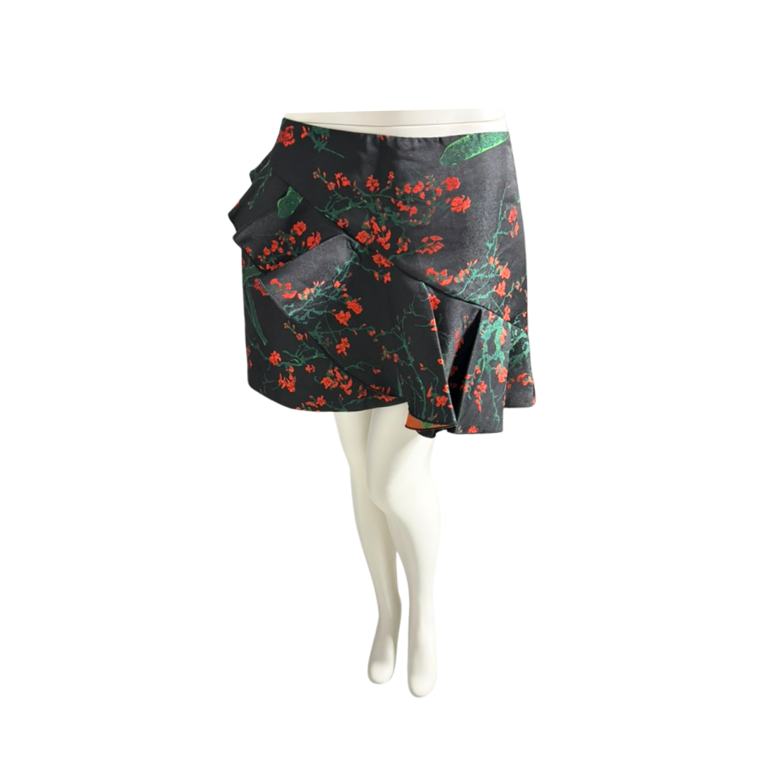 Floral patterned skirt on a mannequin against a white background