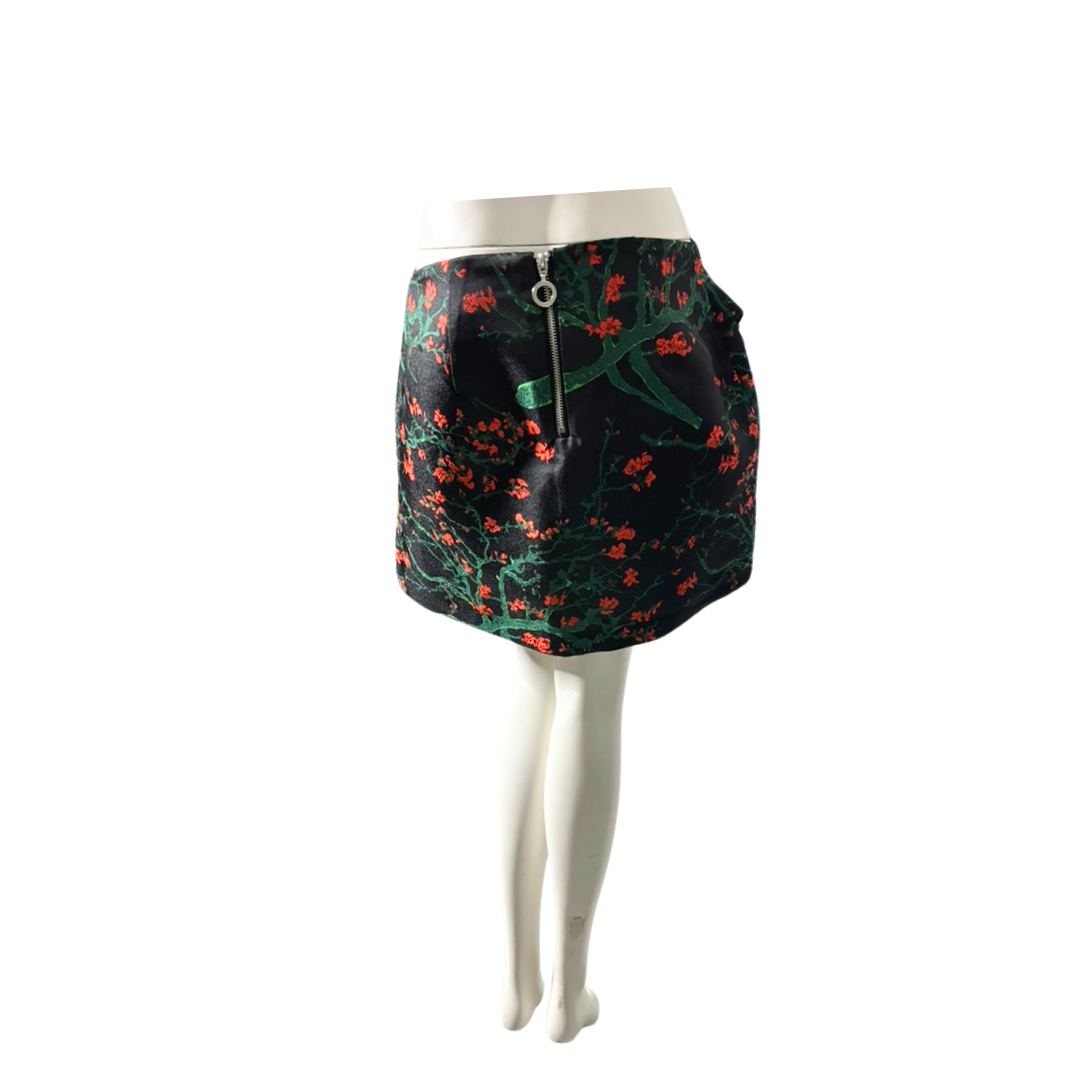 Floral patterned skirt on a mannequin against a white background