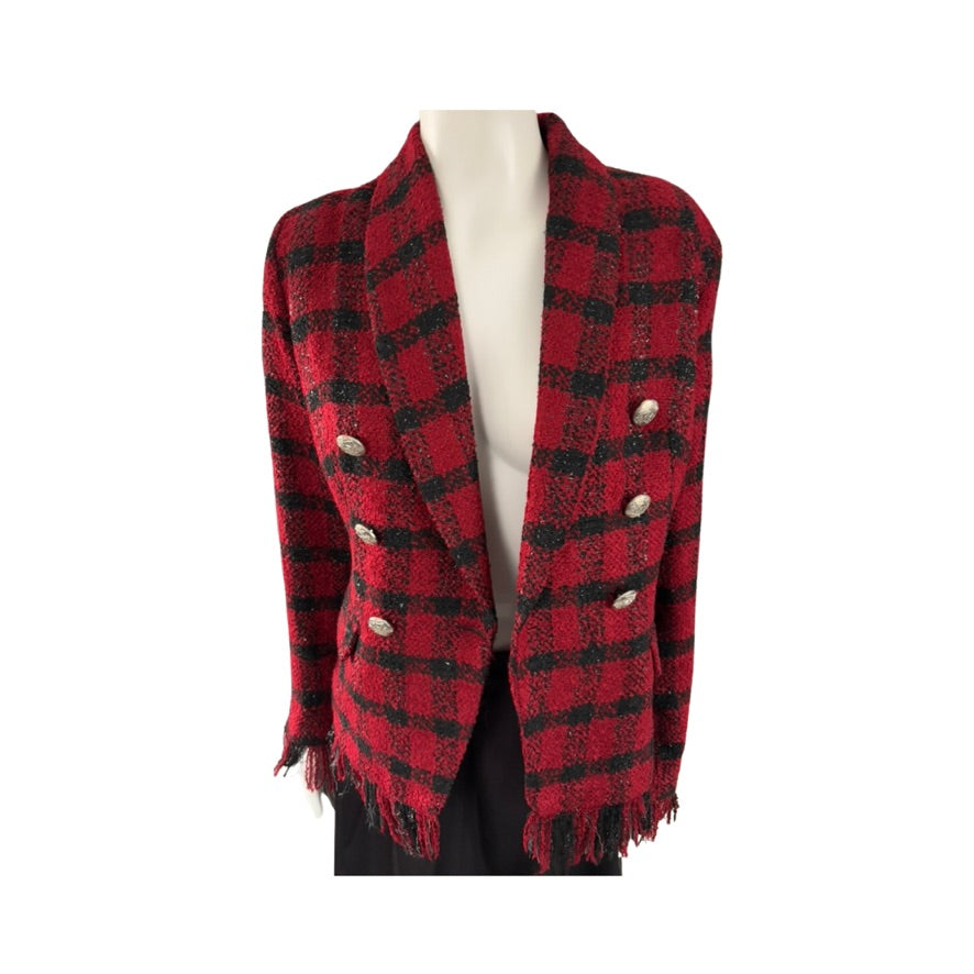 Red and black plaid jacket on a mannequin against a white background