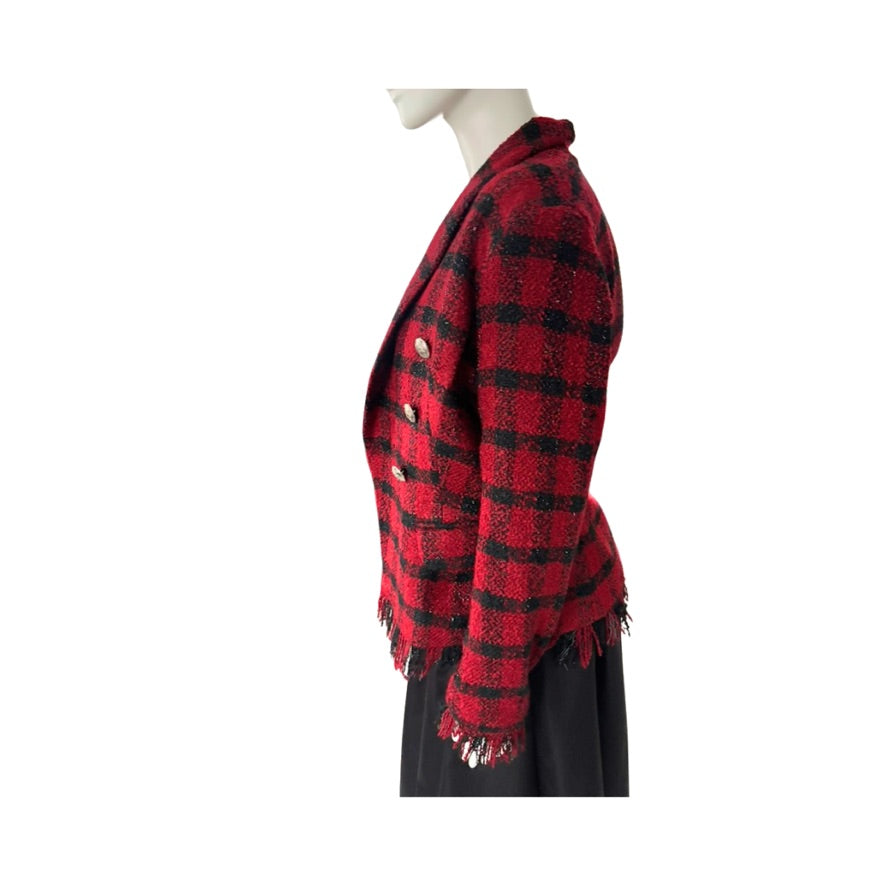 Red and black plaid jacket on a mannequin against a white background
