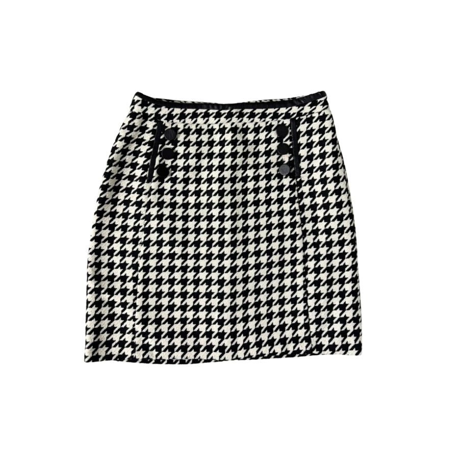 Black and white check skirt on white background