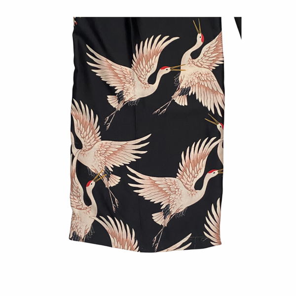 Black fabric with pink crane bird pattern