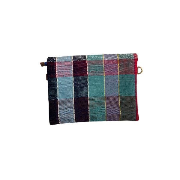Plaid patterned pouch on a white background