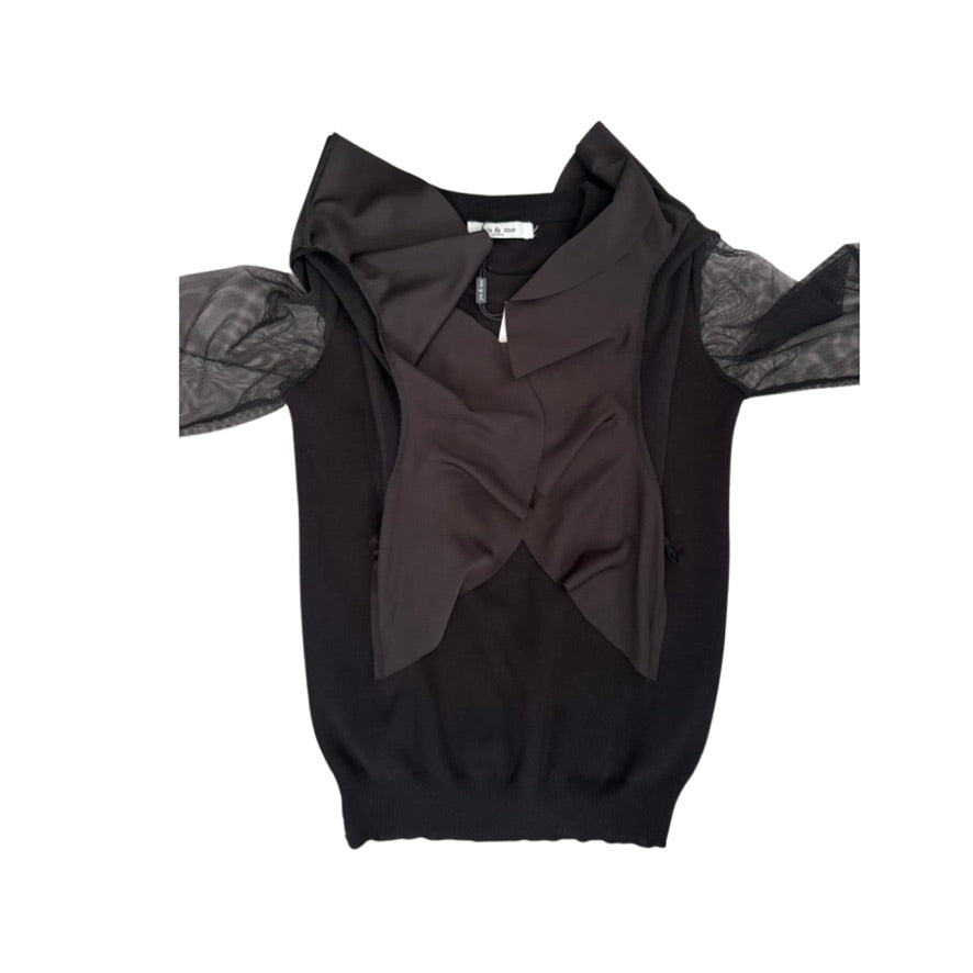 Black top with unique design on a white background