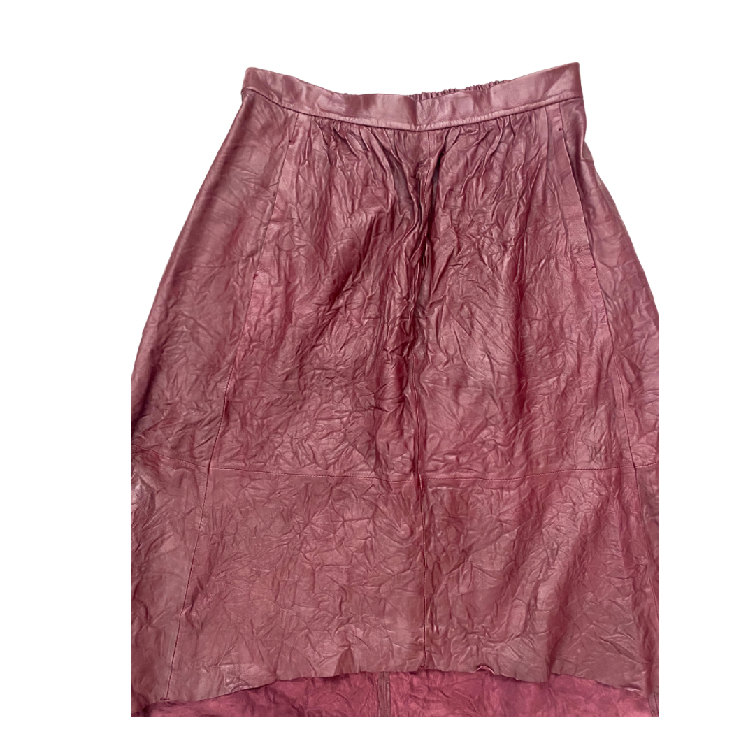 Burgundy skirt with textured leather on a white background