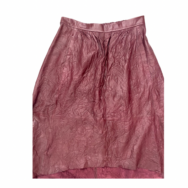 Burgundy skirt with textured leather on a white background