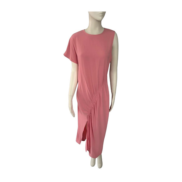 Mannequin wearing a pink dress on a white background