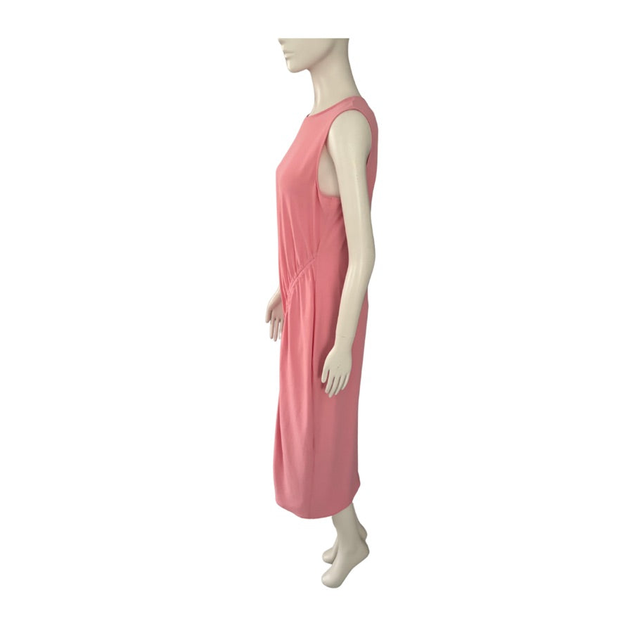 Mannequin wearing a pink sleeveless dress on a white background