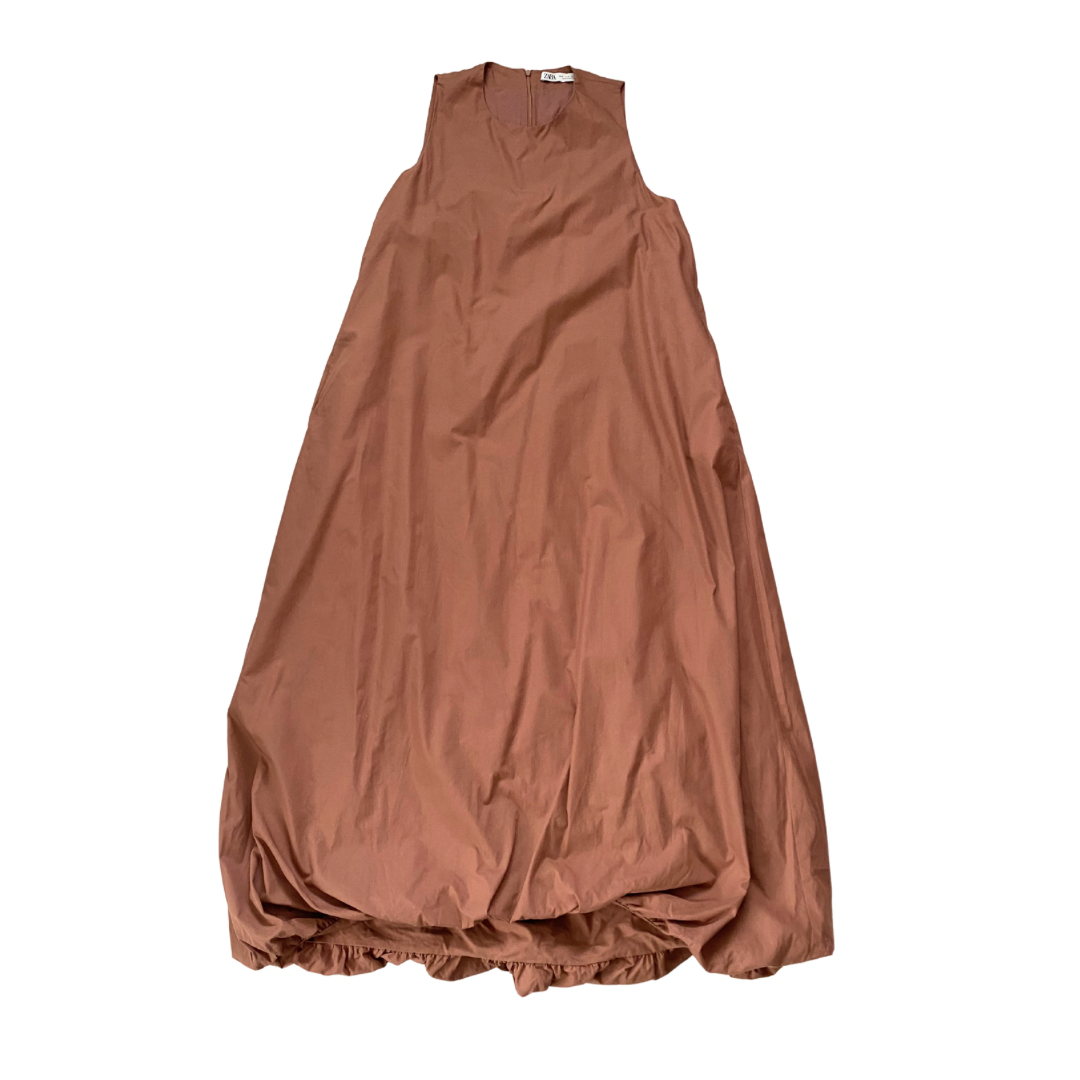 Brown bubble hem dress on a white background