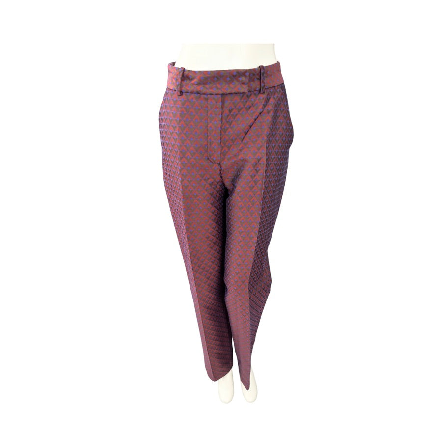 Maroon patterned pants on a white background