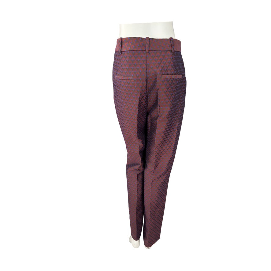 Maroon patterned pants on a white background