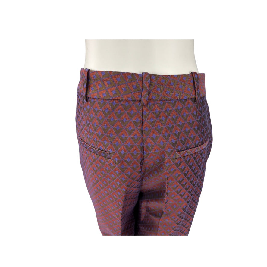 Patterned pants on a mannequin with a white background