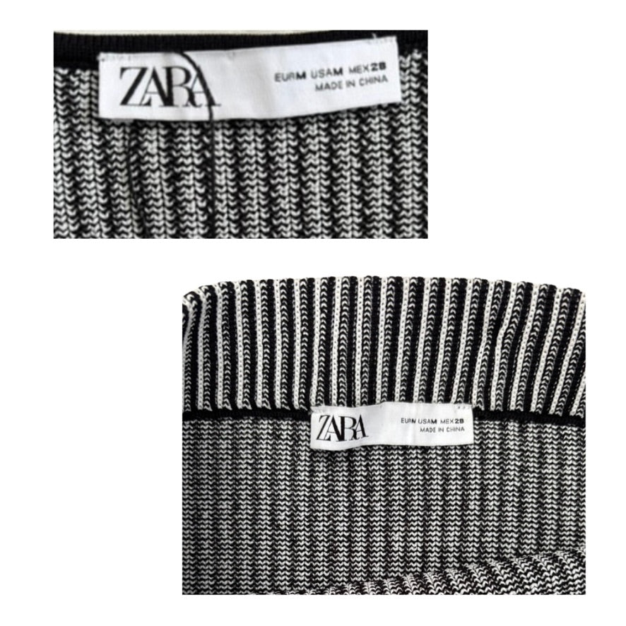 Two black and white striped socks with Zara labels on a white background