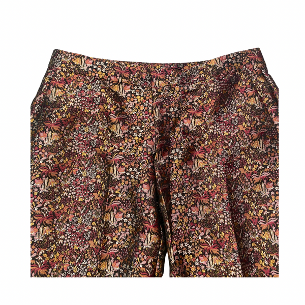 Floral patterned pants on a white background