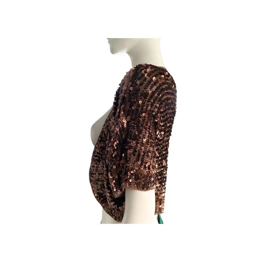 Bronze sequin top on a mannequin against a white background