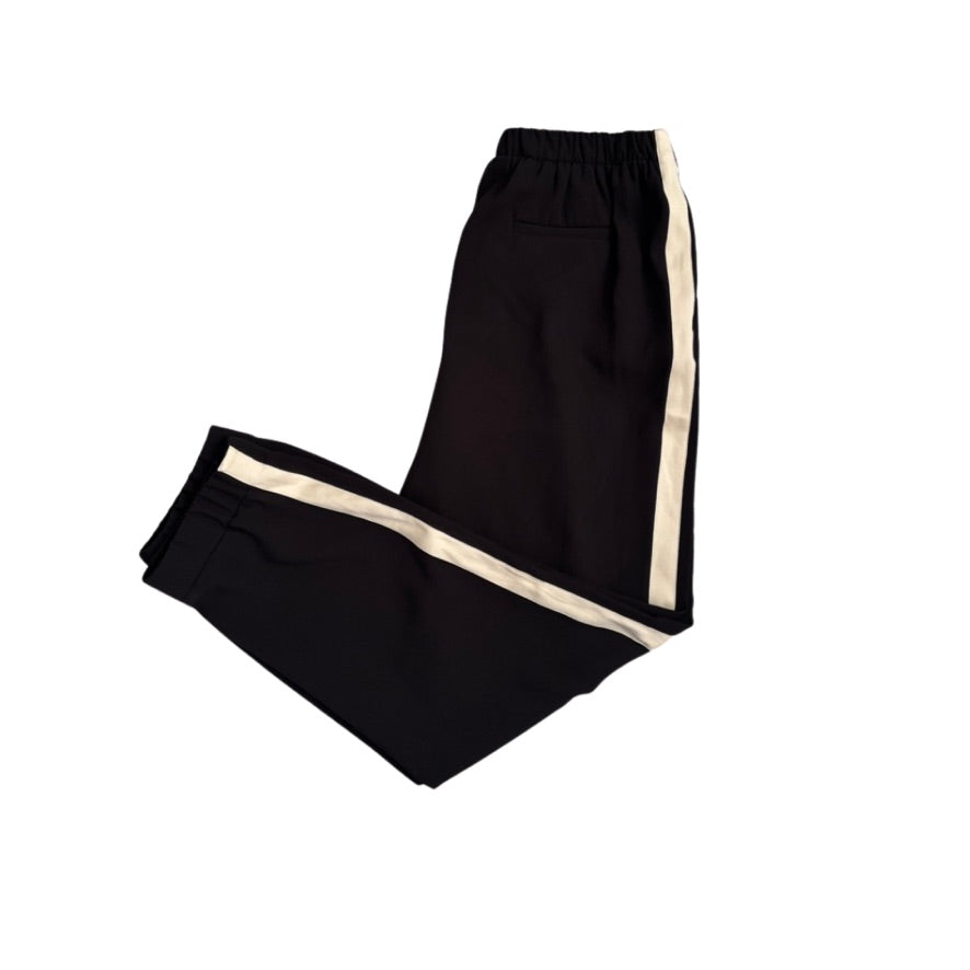 Black pants with white stripes on a white background