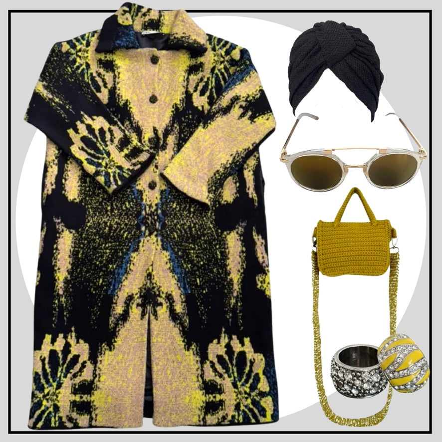 Outfit with a patterned coat, turban, sunglasses, handbag, and jewelry on a white background