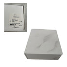 White shoe box with a smaller inset showing product details on a white background