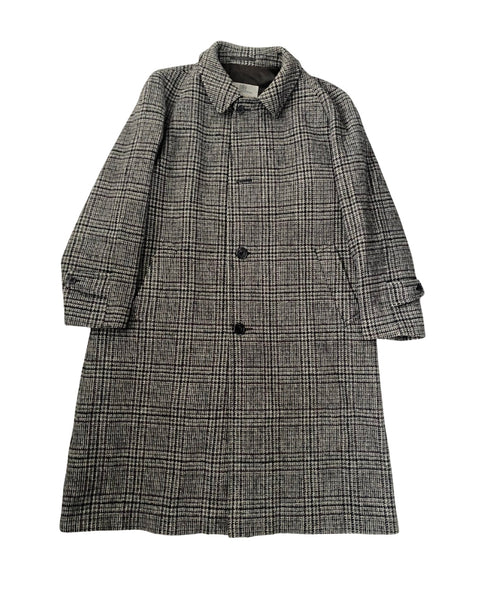 Gray checkered coat on a white background