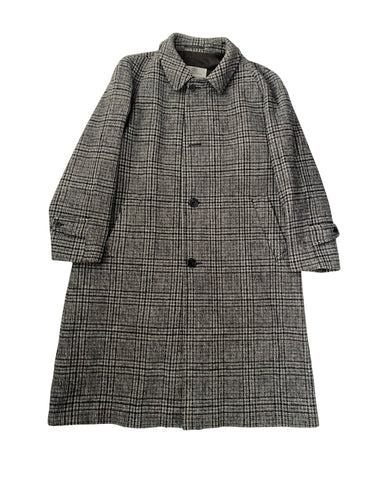 Gray checkered coat on a white background