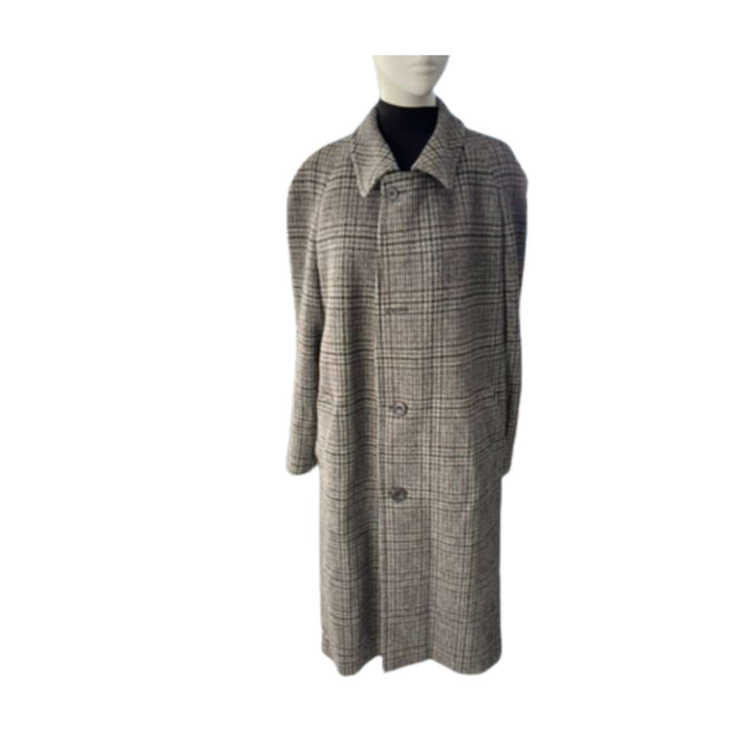 Plaid coat on a mannequin against a white background