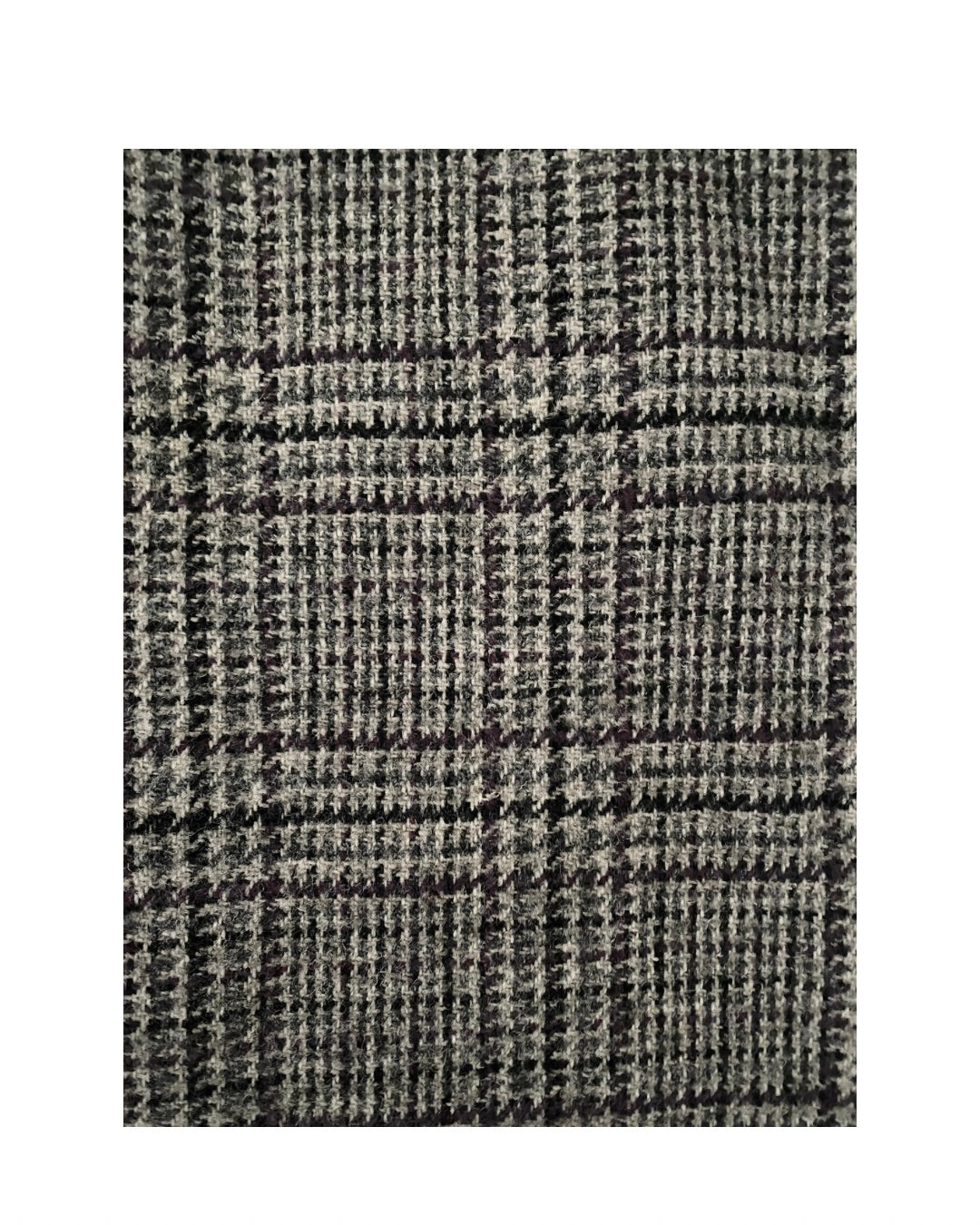 Textured fabric with a checkered pattern on a white background