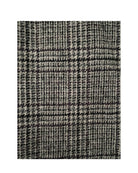 Textured fabric with a checkered pattern on a white background