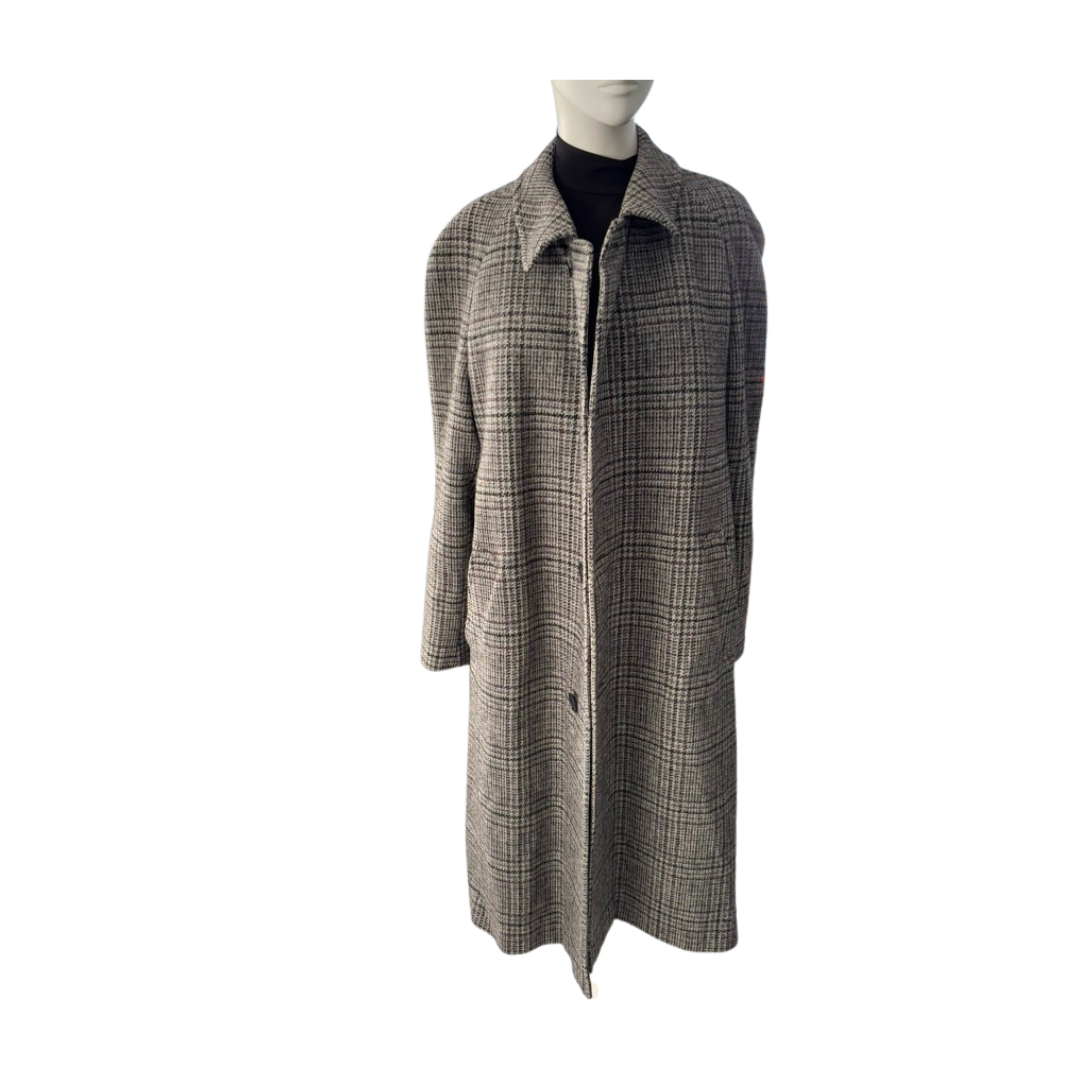 Plaid coat on a mannequin against a white background