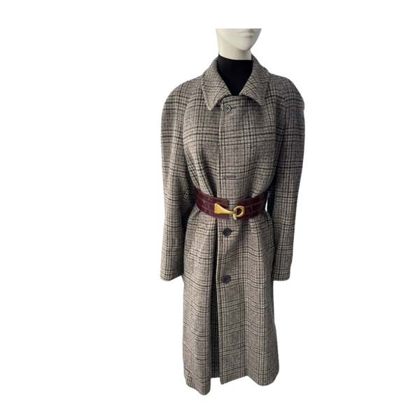 Plaid coat with a belt on a mannequin against a white background