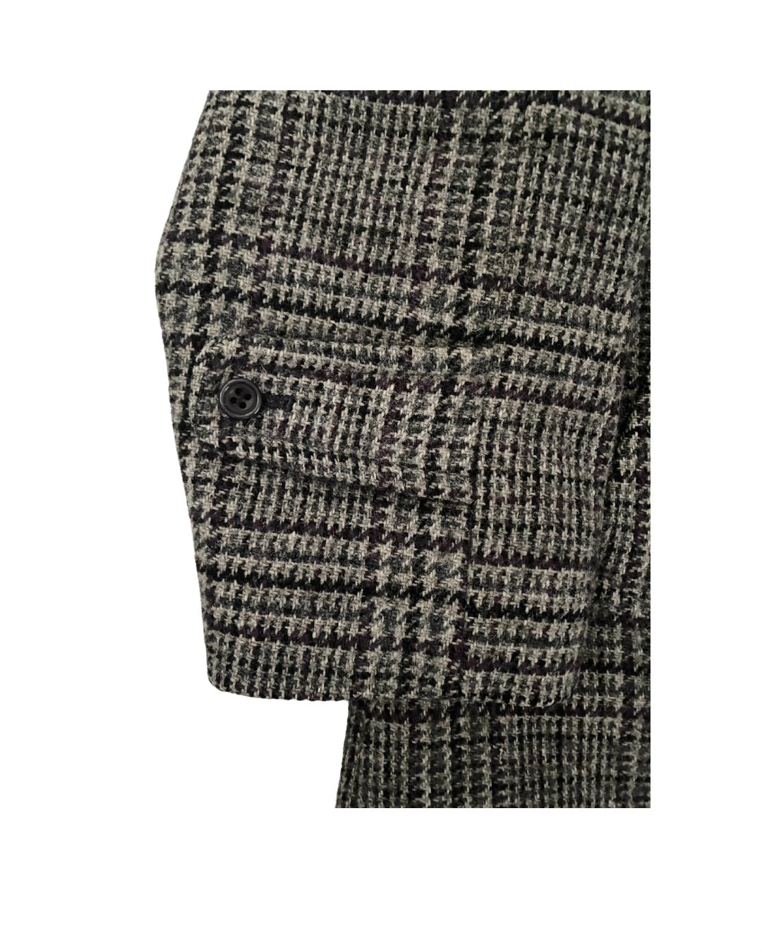 Close-up of a houndstooth patterned fabric on a white background