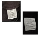Clothing label with care instructions on a black background