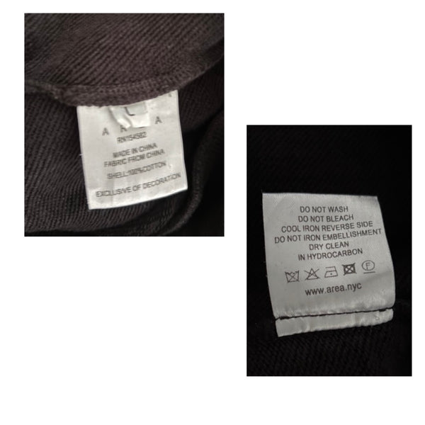 Clothing label with care instructions on a black background