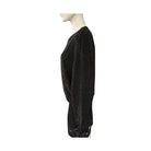 Black textured sweater on a mannequin against a white background
