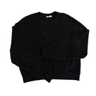 Black textured sweater on a white background