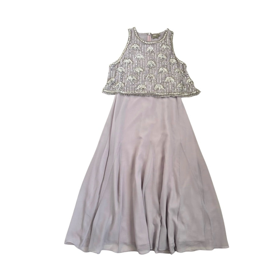 Long light purple dress with embroidered top on a white background