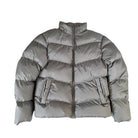 Grey puffer jacket on a white background