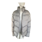 Grey puffer jacket on a mannequin against a white background