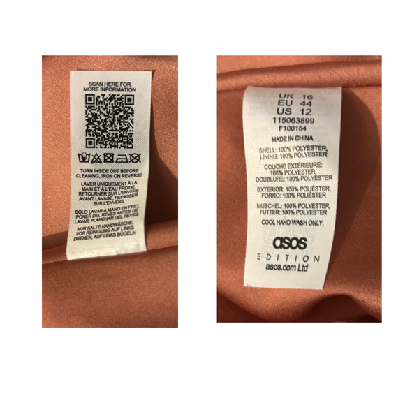 Clothing labels with QR code and text on a brown fabric background
