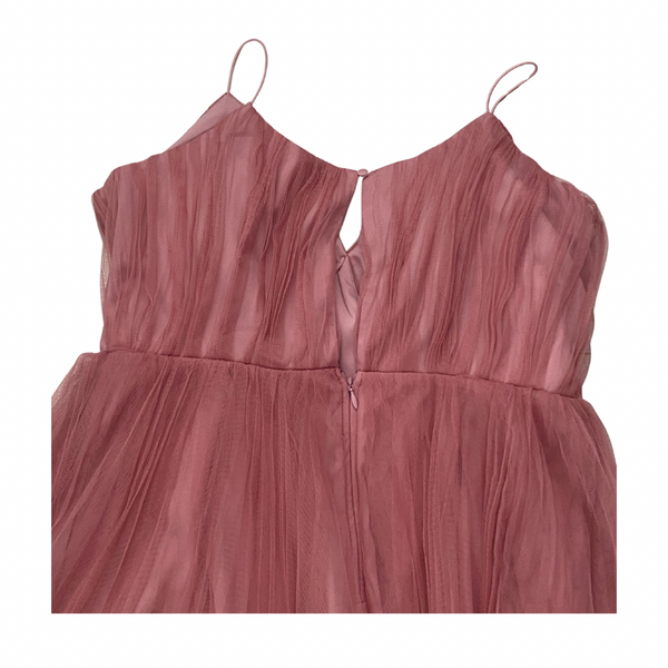 Pink sleeveless dress on a white background