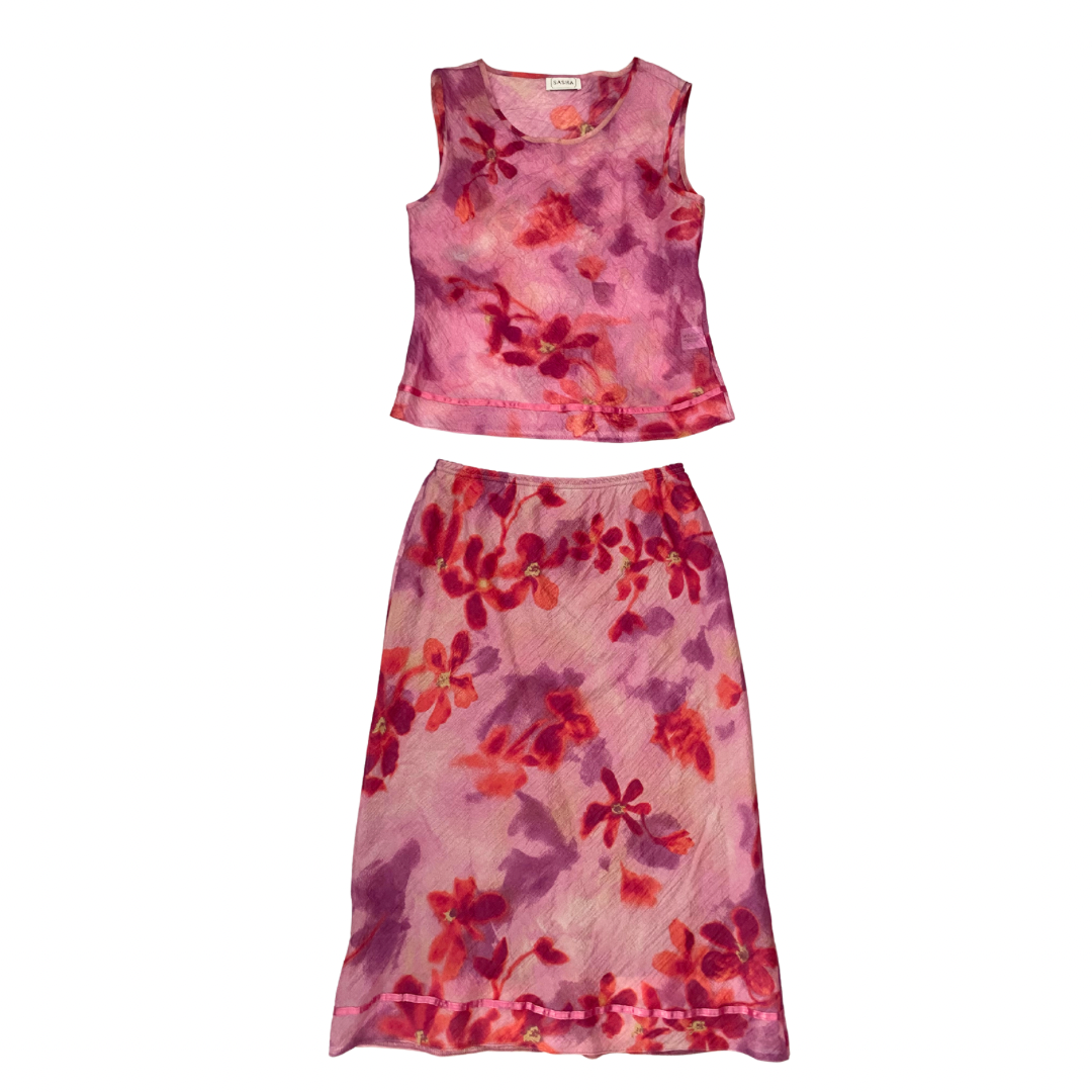 Lemara two-piece floral set with sleeveless top and matching midi skirt in pink, purple, and fuchsia, size M, laid flat.