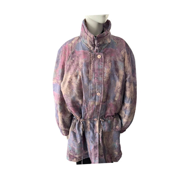 Multicolored coat on a mannequin against a white background