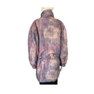 Multicolored jacket on a mannequin against a white background