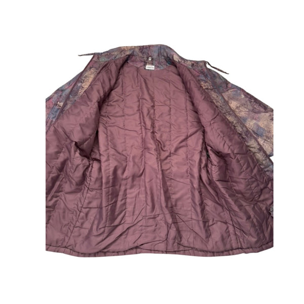 Purple quilted cover with camouflage pattern on a white background