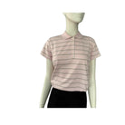 Mannequin wearing a pink and white striped shirt on a white background