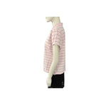 Mannequin wearing a pink and white striped shirt on a white background