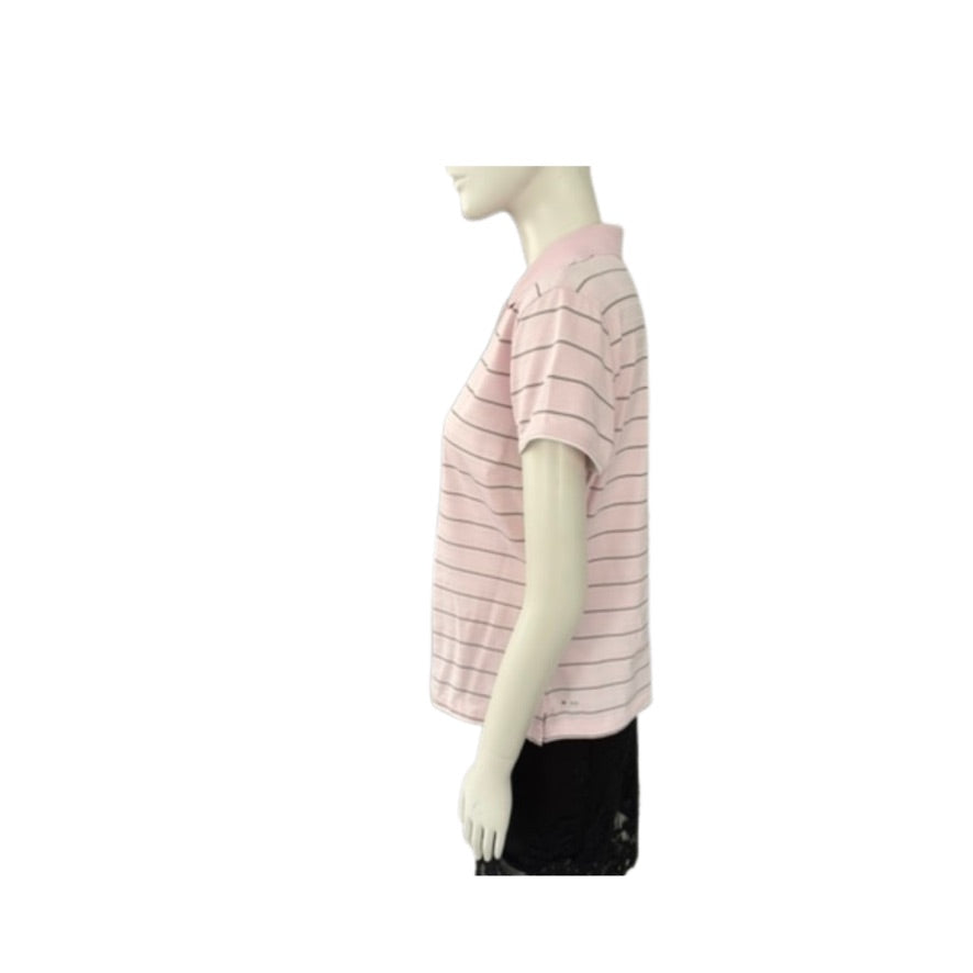 Mannequin wearing a pink and white striped shirt on a white background